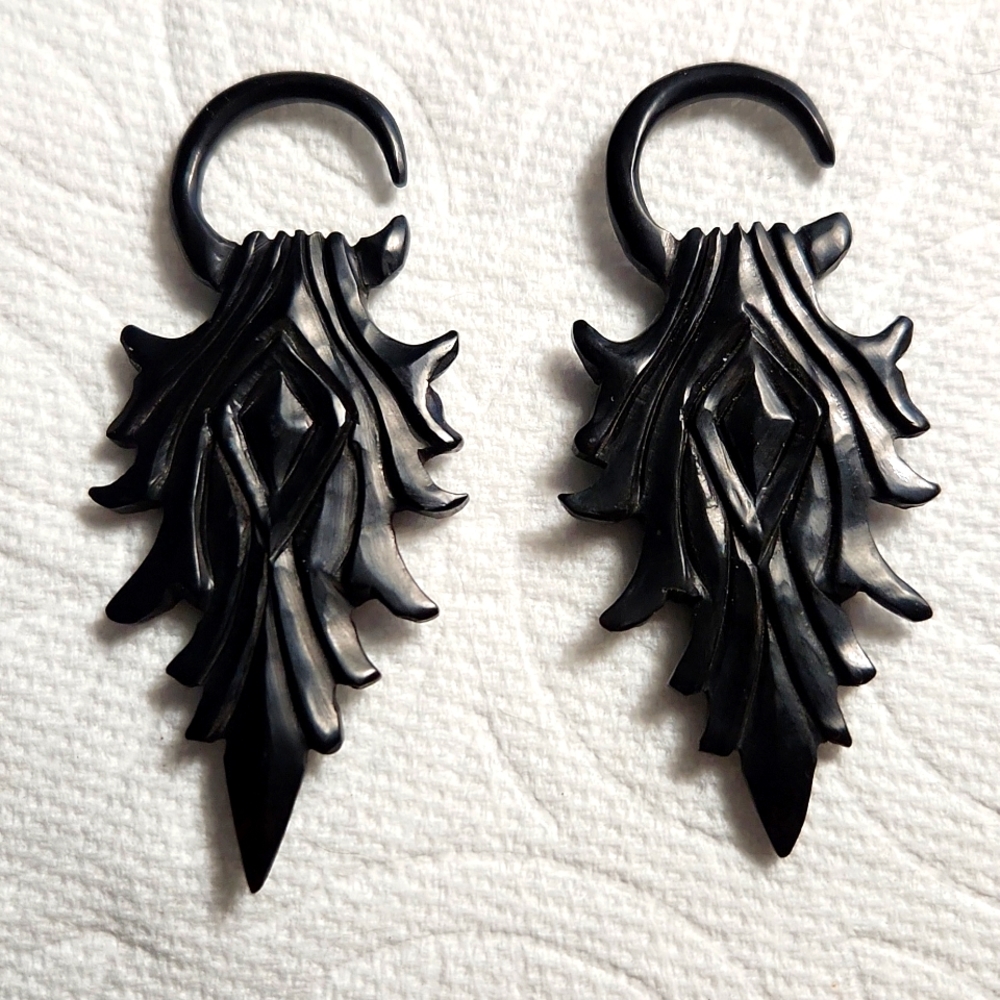 Hand carved earrings